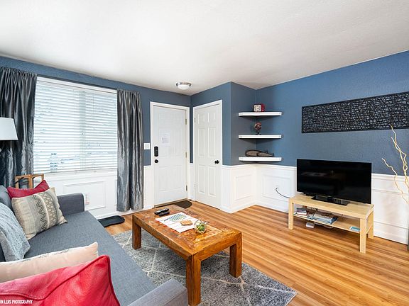 Roomy living area with blackout blinds to block the Midnight Sun in summer