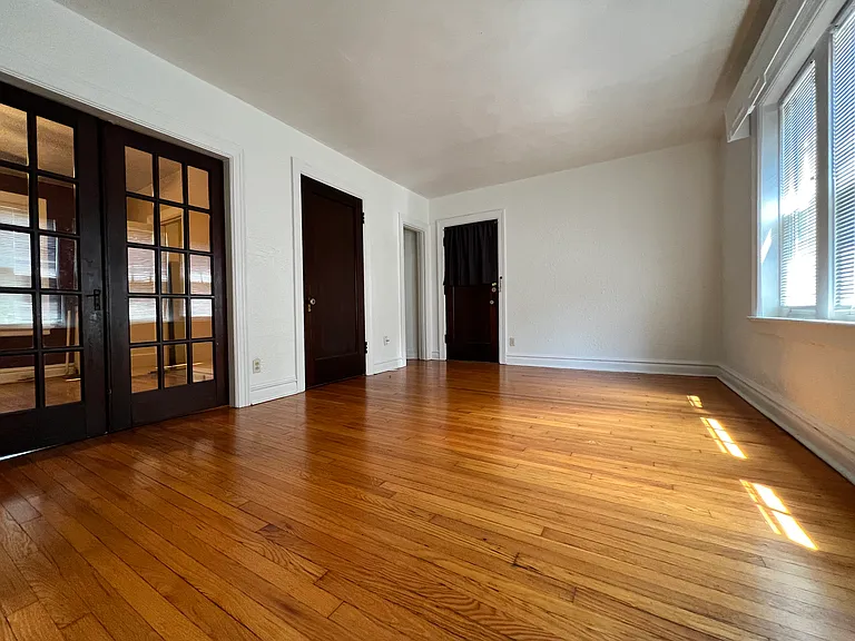 Another viewpoint of the same room. From this angle, you can see there are two closets next to the front entry door.