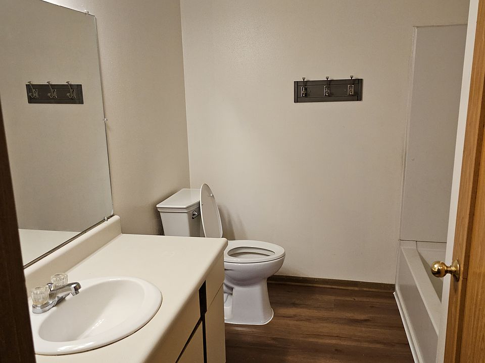 Full bath #1 with full linen closet.
