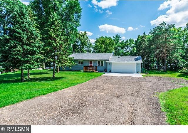 Looks are deceiving - over 2,400 fsf in this private lake home on almost 1 acre with 150' of lakeshore! Move in ready!