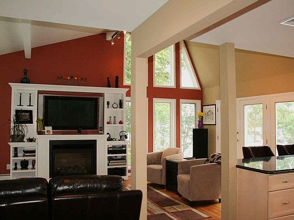 Family room  Built-in entertainment center, fireplace and cathedral ceilings.