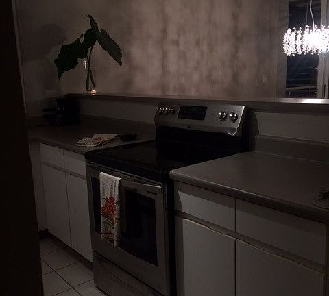 Kitchen with stainless steel appliances