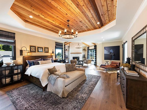 Oversized primary suite with cozy fireside retreat