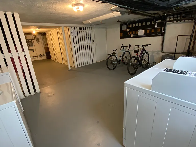 The laundry room and the storage units for each unit