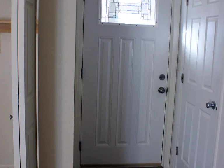 front entry/ door to garage
