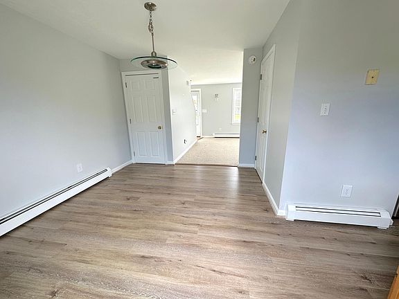 Dining room-
Door on right is the half bath.
Door on left is the basement door.