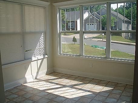 Awesome Sunroom makes a great breakfast room!