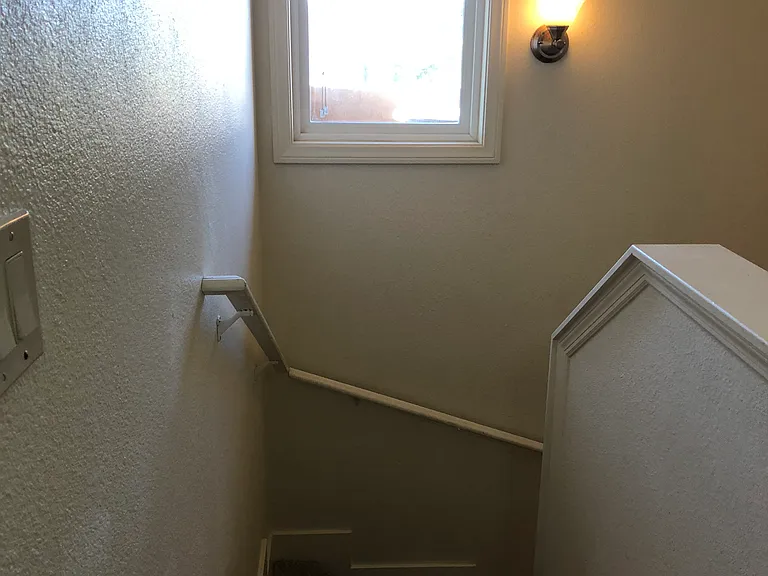 Staircase from second floor to first.