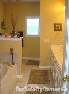 Master Bath
						:
						Master Bath includes separate shower and bath, double vanities and tile floors.