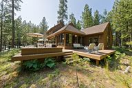 Private corner lot with wrap around deck
