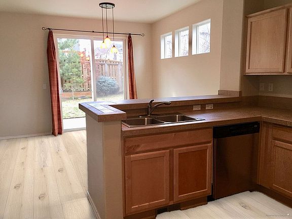 Kitchen facing Back Yard 