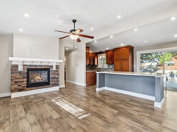Open concept dining room, counter, and kitchen
