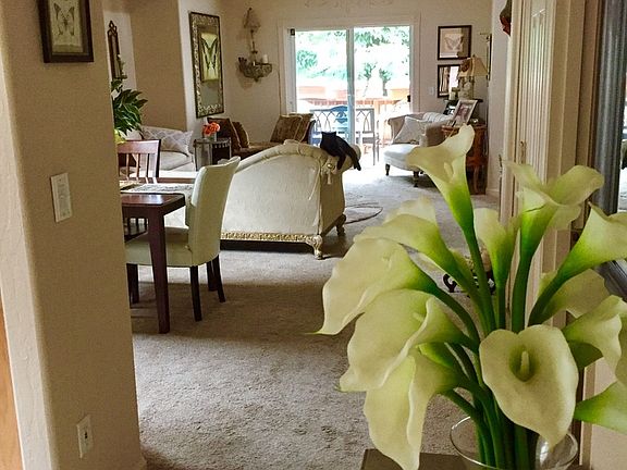 Entryway looking toward main living room and dining room area