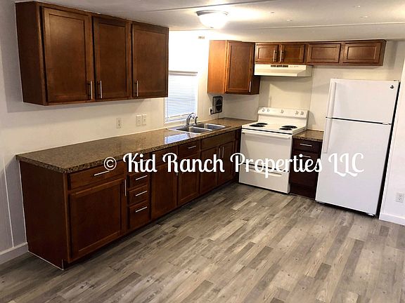 Open Kitchen With Plenty of Cabinets...