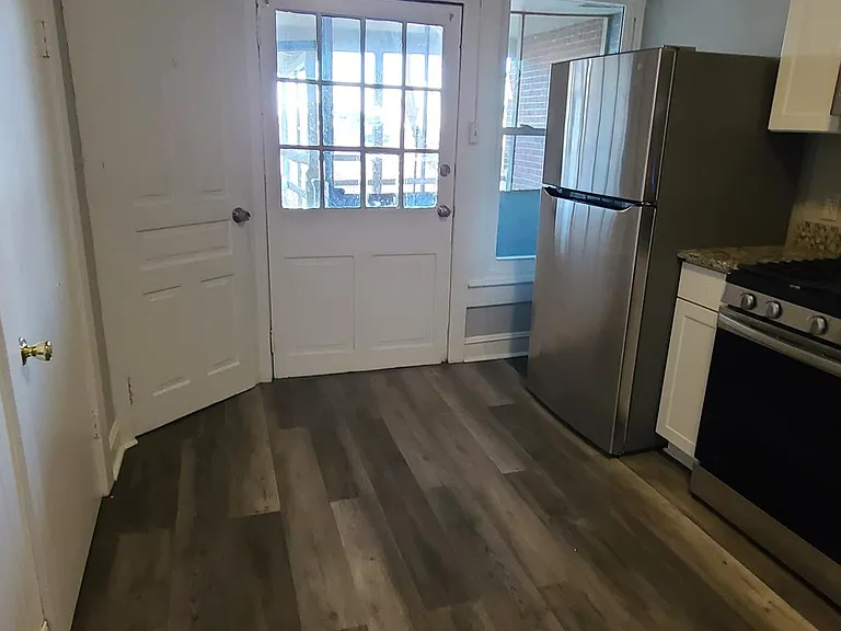 Spacious kitchen with new cabinets & granite counter and stainless steel appliances
