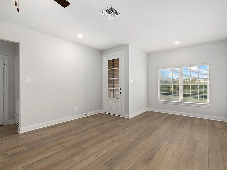 Family room with a window overlook the front of the house.