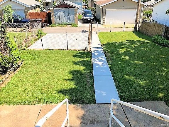 Freshly poured parking pad and sidewalk for easy access