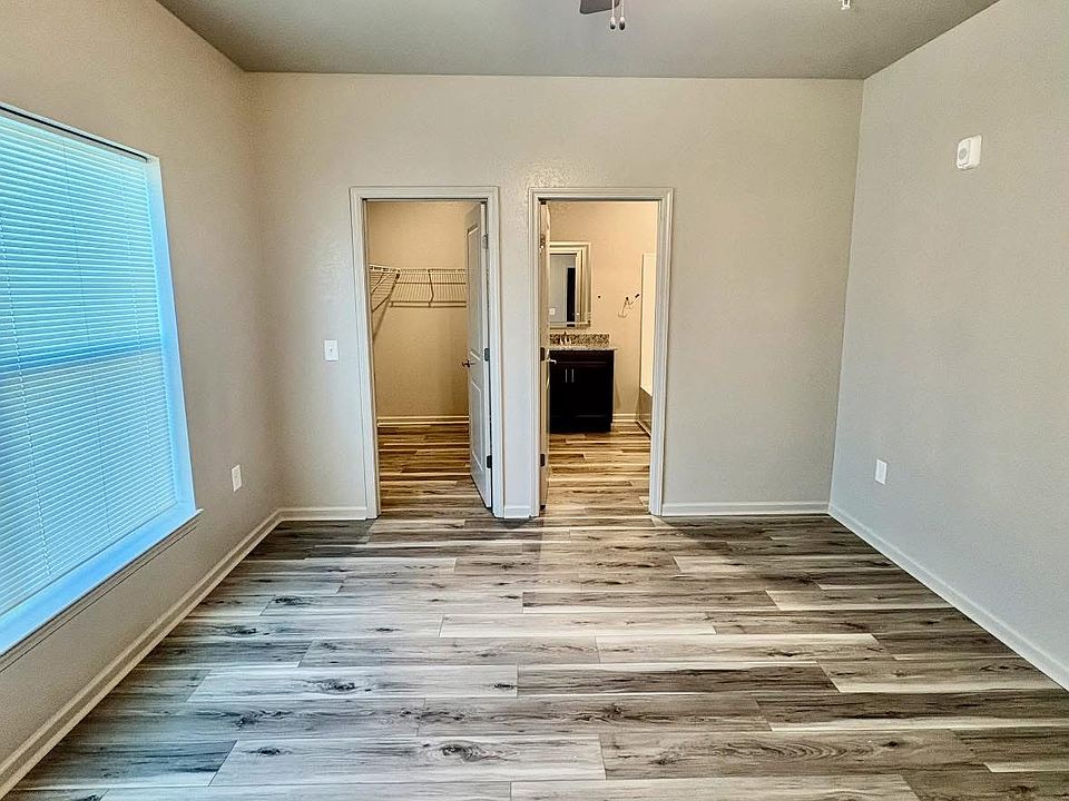 Bright and comfortable bedroom in a roomy 2-bedroom, 2-bath apartment.