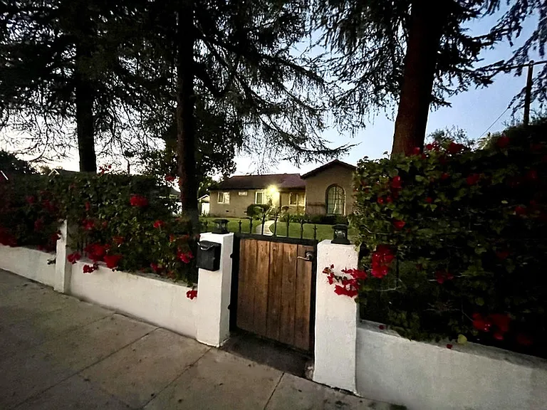 Campus at dusk-- you'll enjoy the privacy of being completely cordoned from the outside world through garden walls lined with bougenvillea