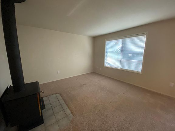 Wood stove in living room adds to coziness