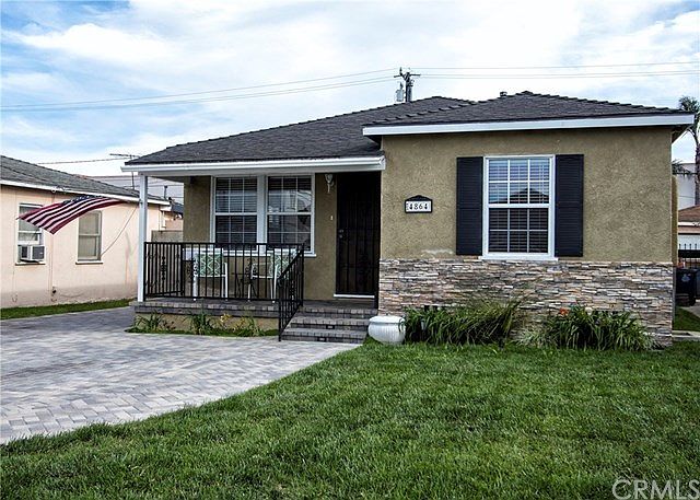 4864 W 142nd Street (Gorgeous Front Yard with Covered Patio)
