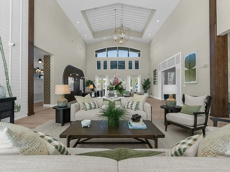 Experience relaxation in this elegantly designed lounge featuring high ceilings and ample natural light.