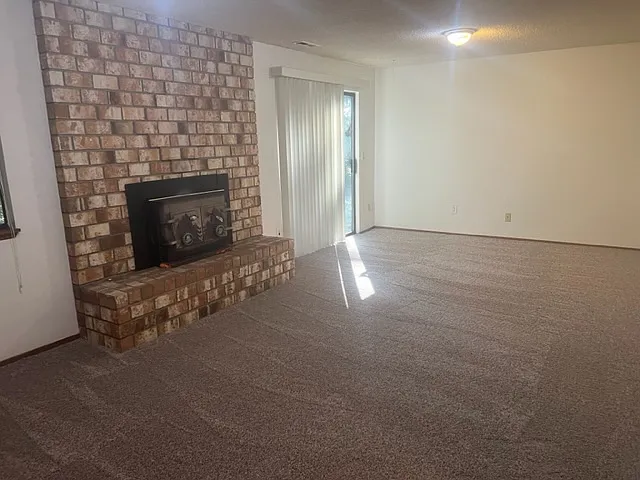 Downstairs Family Room with Wood Burning Fireplace