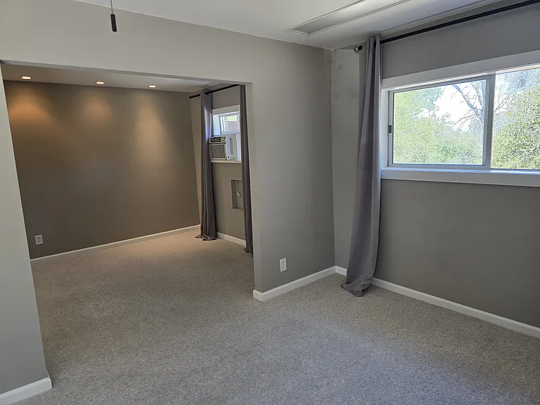 Looking from the living space to the bedroom space.
