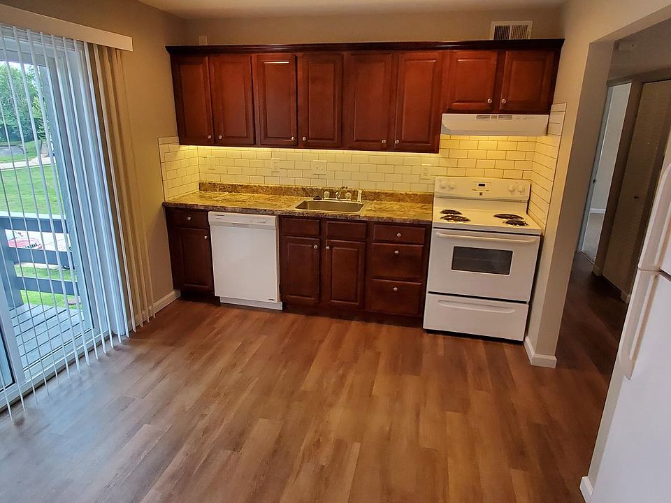 Spacious eat-in kitchen with a deck.