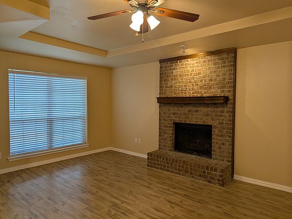 Wood- burnig fireplace and large windows