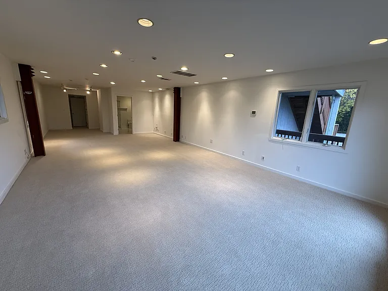 The extra-large bonus room has a closet, in-suite bathroom, comfortable plush carpet and a patio door leading to the exterior wrap-around hanging walkway. This versatile space may also serve as a fourth bedroom.