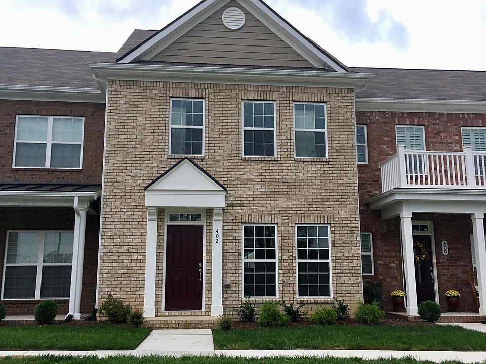 Front yard is very private with tree line and long walking p