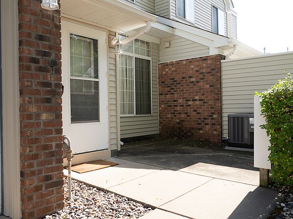 Outdoor patio off of the front. Room for a table and chairs or other patio furniture.