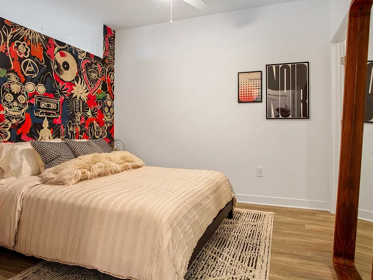 A bedroom that blends bold design with serene comfort.