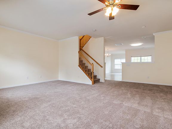 Light & spacious living, kitchen, and dining area.