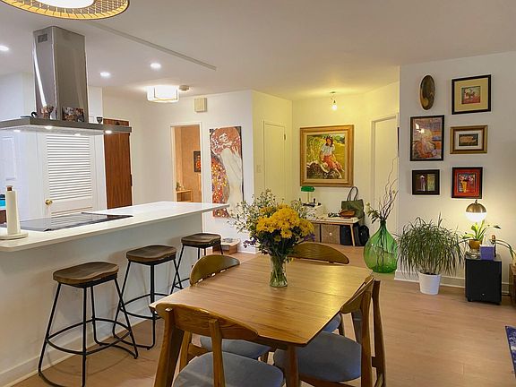 Open kitchen and dining room, with breakfast bar