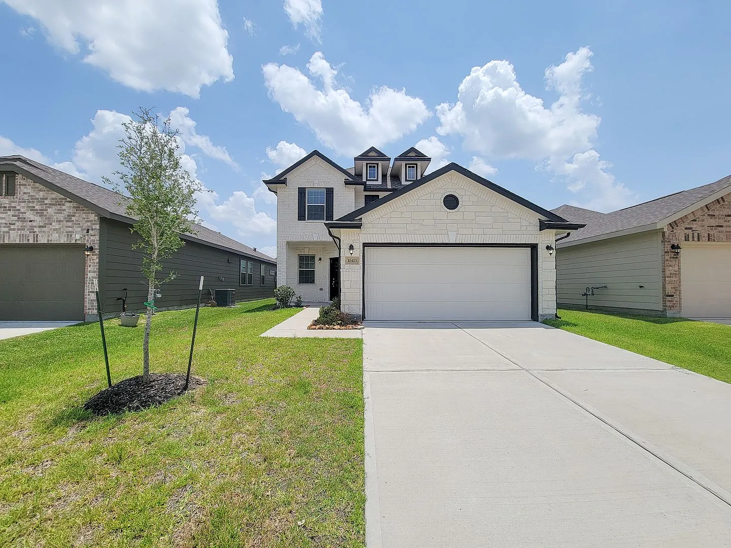 Welcome home to Willowpoint, a charming community in Tomball. This two-story Wilmington II home d... — Photo 1