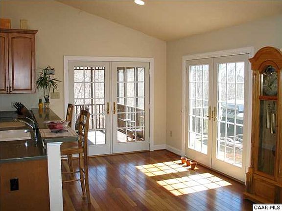 Dining Area opens to the front deck & screen porch