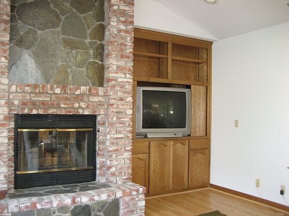 L/R with floor to ceiling fire place and built in entertainment center