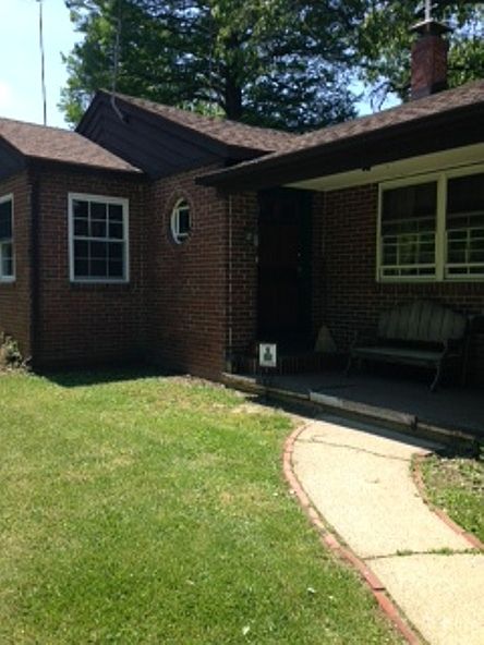 beautiful brick and cedar