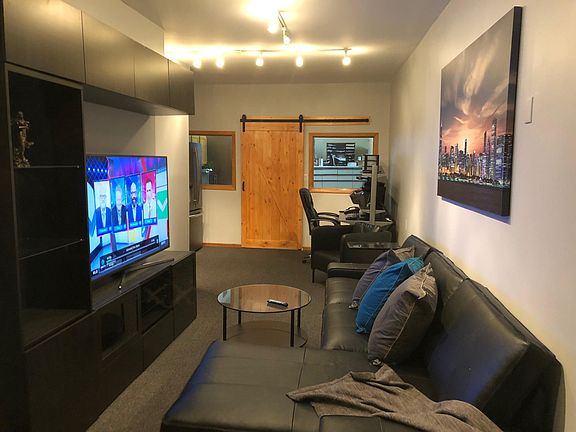 New Leather couch with 60" TV