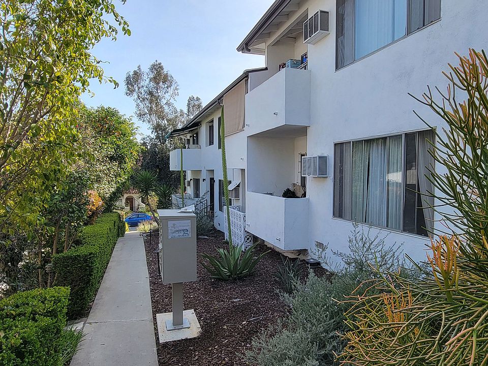Private balconies and mature landscaping at the Hardison Apartments in Pasadena, California.