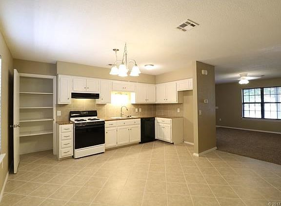 Dining area and Kitchen from Laundry Closet