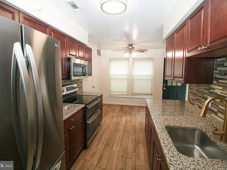 11325 Halethorpe Ter #207 — Photo 6