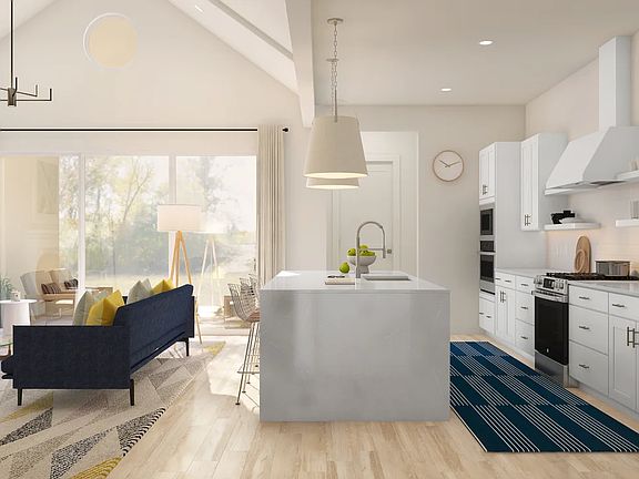 Kitchen with quartz island and countertops