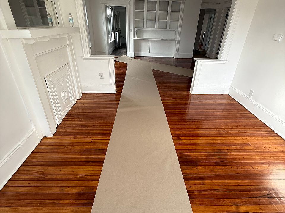 Living room, opening into the dining room space.