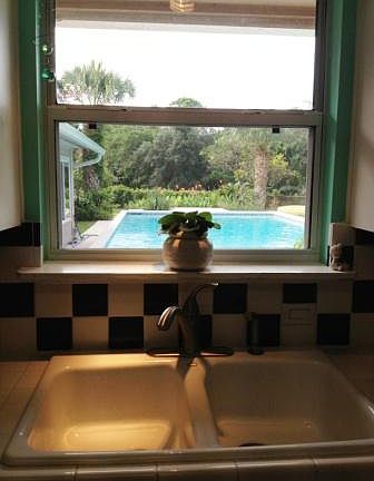 Kitchen with Pool/Creek view