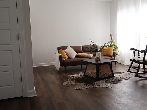 1st floor has an open space that acts as an entertainment room right off the front door.1st floor also has a half bath and a large coat closet for storage.