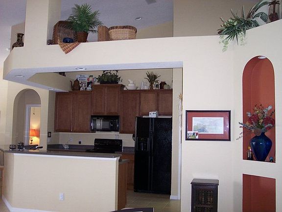 Kitchen with decorative soffits  - opens to family room