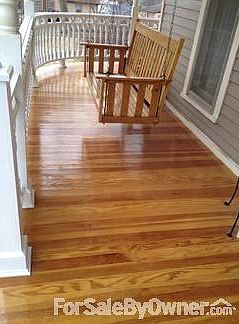 Wrap-around porch with beautiful floor